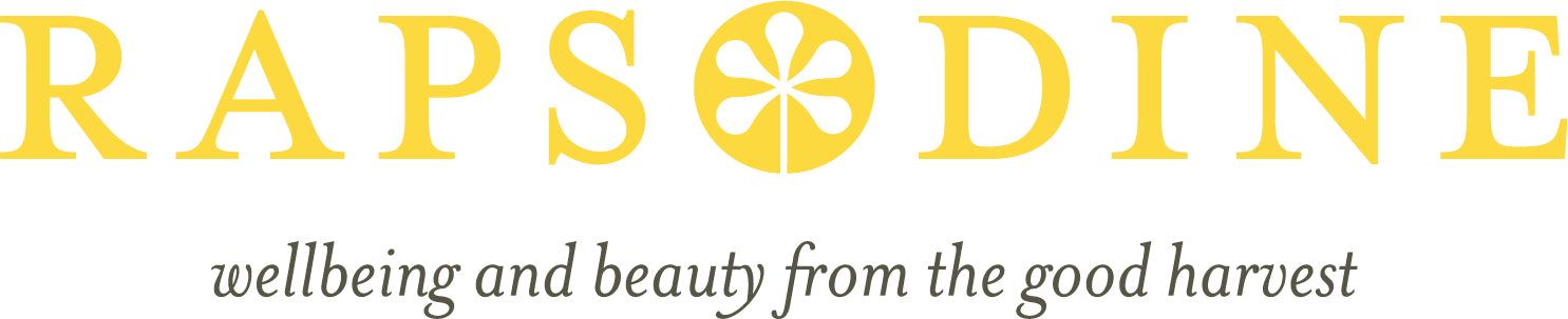 Rapsodine logotyp med payoff “wellbeing and beauty from the good harvest”