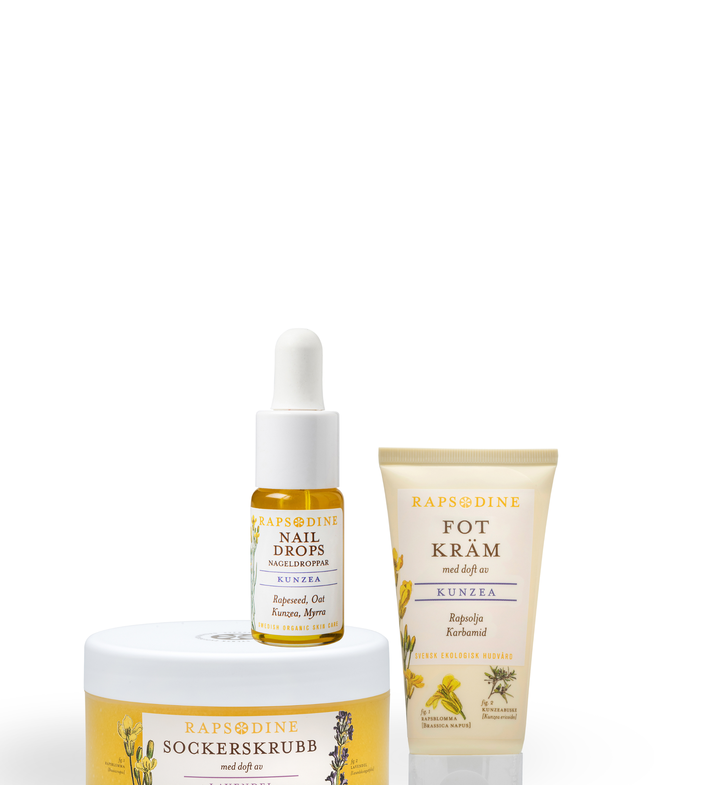Rapsodine sockerskrubb, fotkräm Kunzea och Nail Drops naturlig hudvård på vit bakgrund
